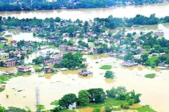 Assam floods: People take shelter on highways as houses remain inundated, over 45.34 lakh affected